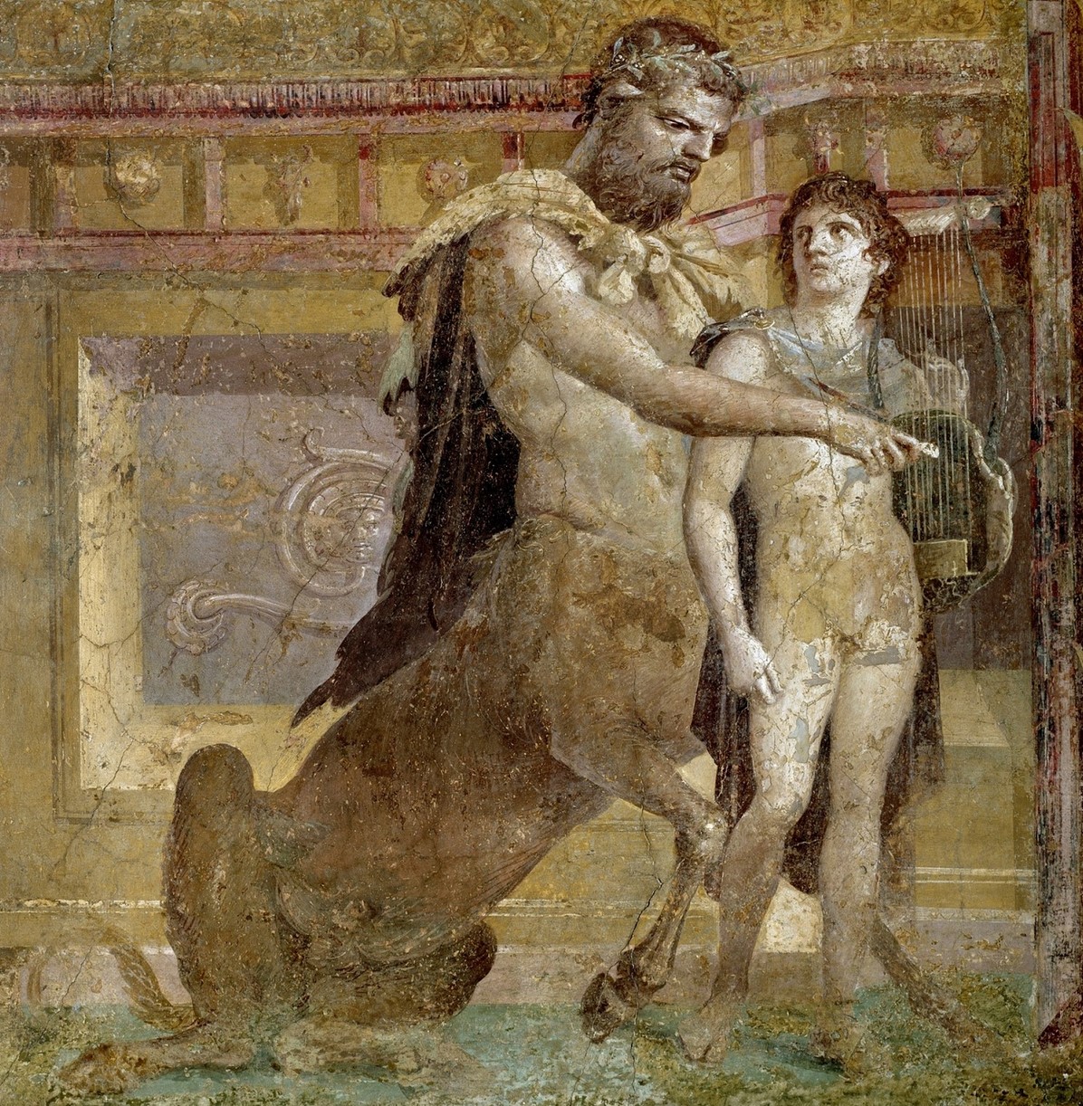 Centauro Chirone insegna ad Achille ad accordare la lira, affresco da Ercolano – Museo Archeologico Nazionale di Napoli IT