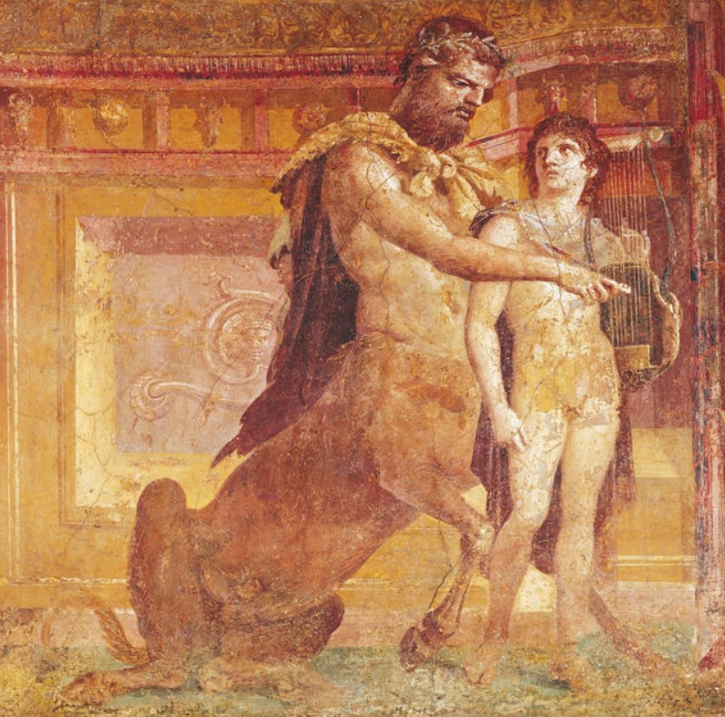 El centauro Quirón enseña música al joven Aquiles, fresco desde el Augusteum de Herculano – Museo Nacional de Nápoles IT